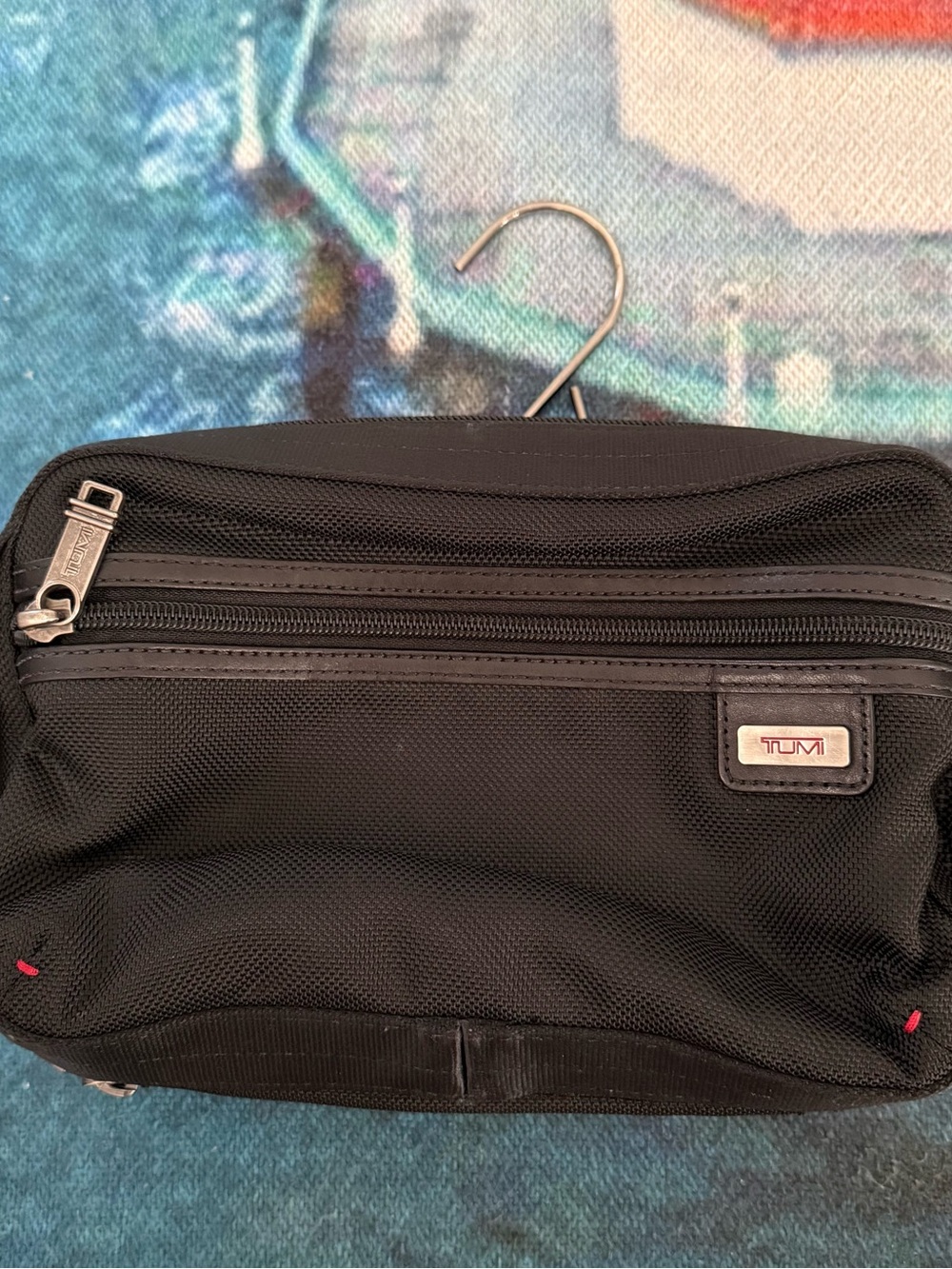 NWOT Tumi Black and Silver Logo Travel Pouch